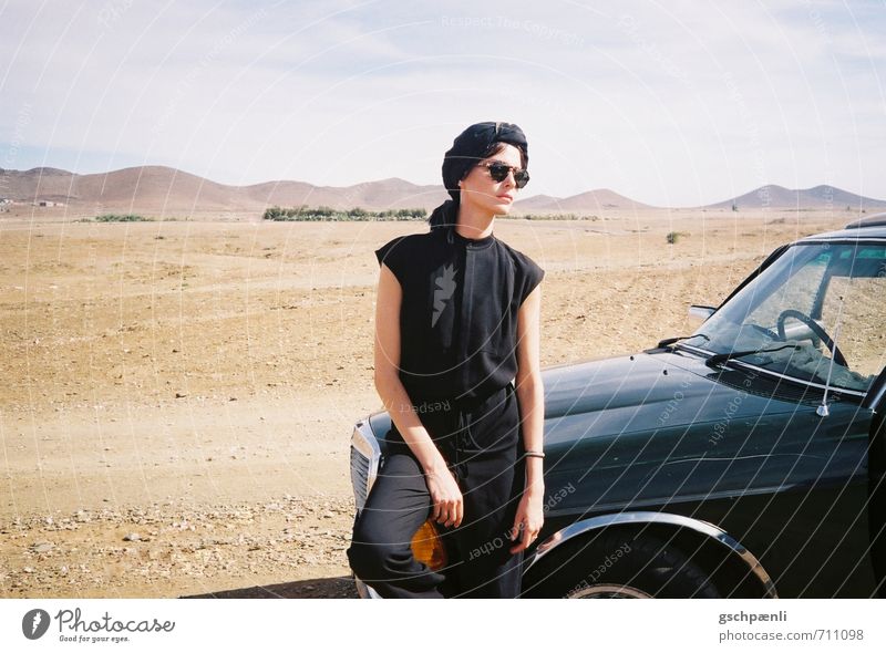 in the desert Style Adventure Far-off places Sun Feminine Woman Adults Arm 1 Human being Nature Landscape Sand Desert Vehicle Wait Esthetic Cool (slang) Elegant