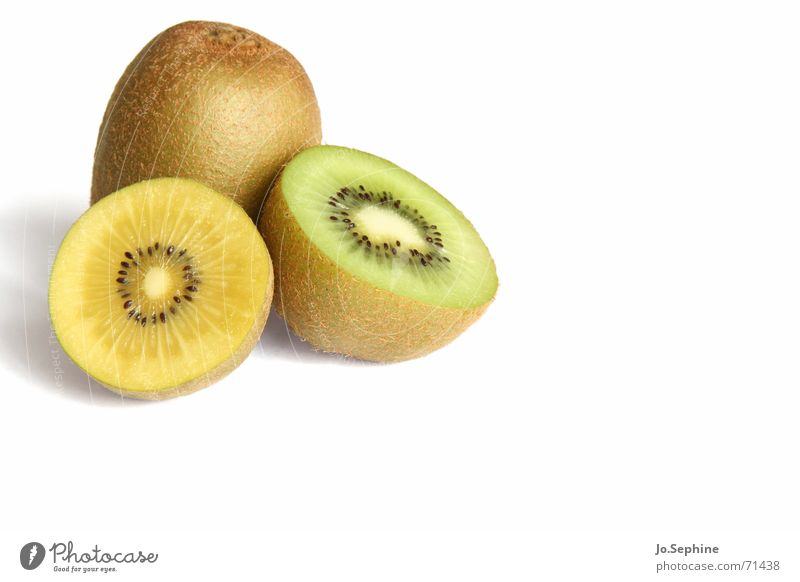 Kiwi I Kiwifruit Tropical fruits Fruit flesh varieties variety Half Kernels & Pits & Stones Part Sliced halved Round Division compromise differences