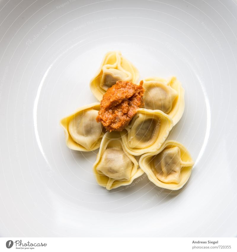 Tortellini with pesto on a white plate pasta Noodles Pasta dish Italien pesto Eating Meal Minimalistic Plate White