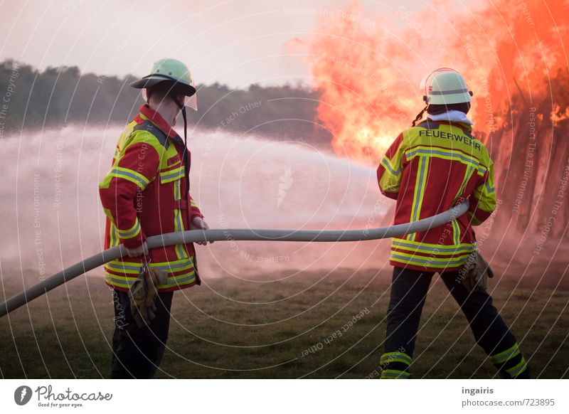 Extinguish fire Professional training Fireman Workplace Fire department Human being 2 Environment Sky wood Smoke Fight Illuminate Hot Yellow Orange Red