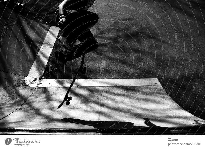 shove it sw Skateboarding Ramp Halfpipe Park Trick Stunt Jump Style Lifestyle Air Parking level street Shadow Sun Black & white photo Trick jump