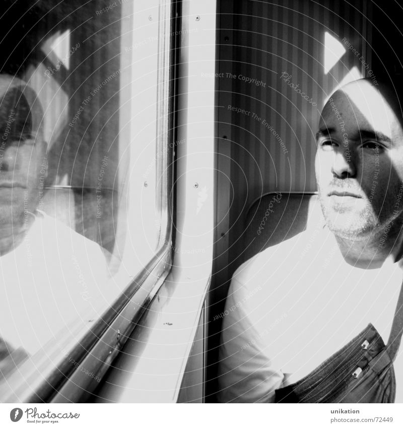 train travel Railroad Commuter trains Reflection Window Window frame Mirror image Man Calm Light Black White Sit view outside Frame framed Wait hardy Shadow