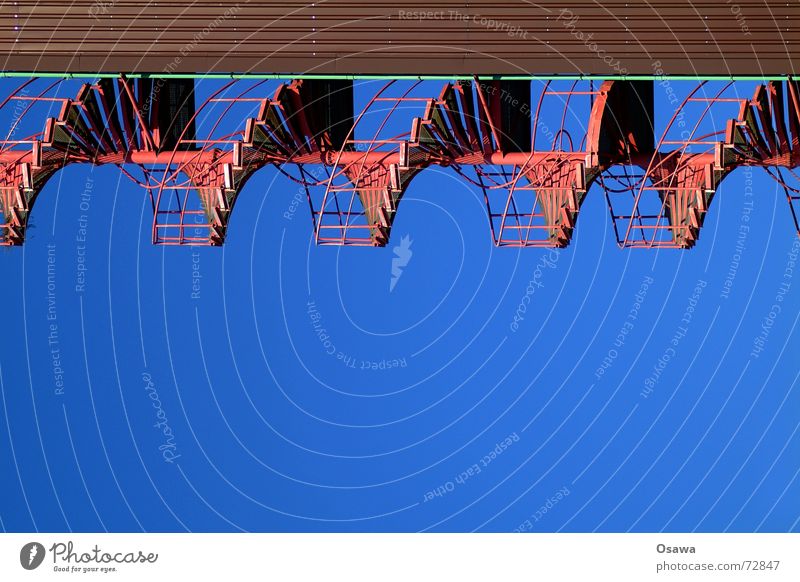 Power plant 1 Winding staircase Sky blue Trapezoidal sheet metal Brown Downward Stairs spiral staircase Blue Beautiful weather Industrial Photography Handrail