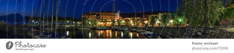 nightly broadside Lake Garda Romance Night To go for a walk Dream Panorama (View) Long exposure torri del benaco boat port Harbour Large Panorama (Format)