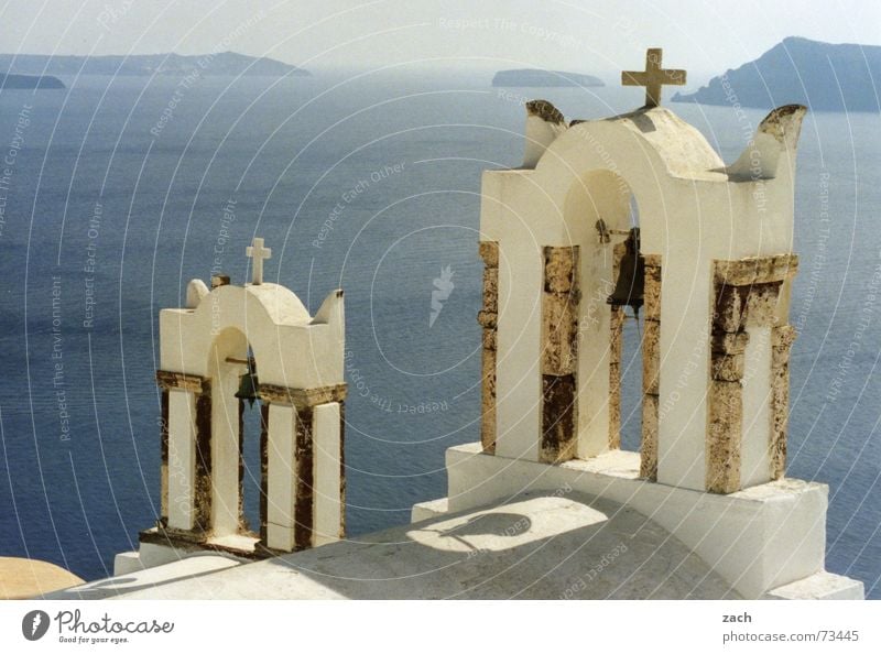 Church on the Abyss Religion and faith Multiple Santorini Volcanic crater Caldera Bell Deities Tall Deep Vantage point Horizon Clergyman White Ocean Lake Greece