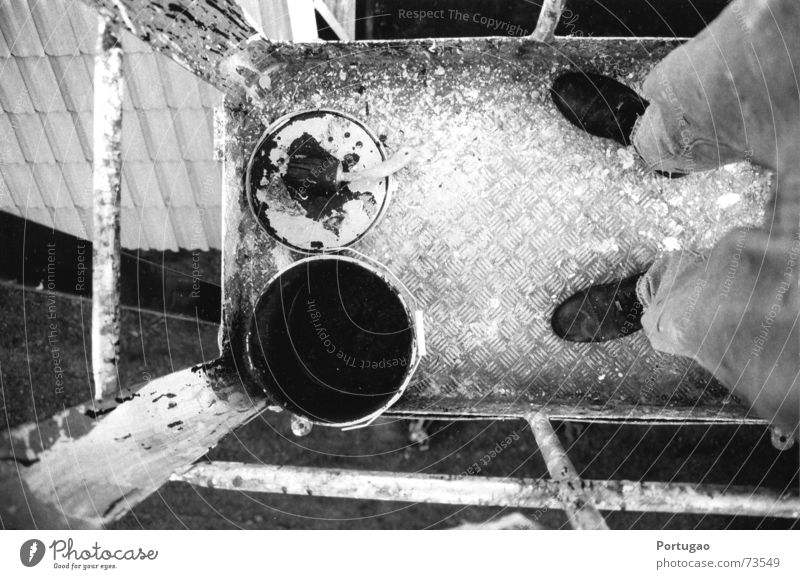 high up Work and employment Painter Construction site Footwear Black White Colour Perspective Paint bucket Handrail Black & white photo Exterior shot Day