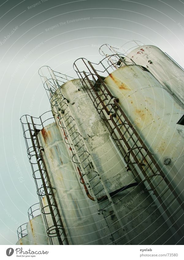 Silo rotting together Gray White Sky Industrial Photography Steel Round Rust Grunge silage grey steps Stairs Grain Metal Old Trashy Dirty