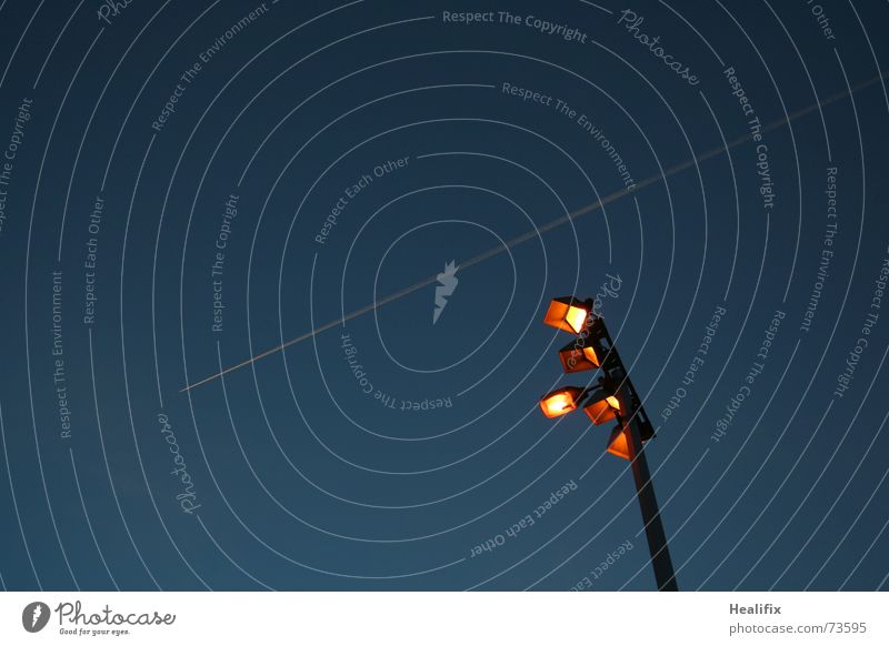 round the clock Vacation & Travel Lantern Lamp post Sky Cloudless sky Transport Passenger traffic Aviation Airplane Passenger plane Propeller aircraft Flying