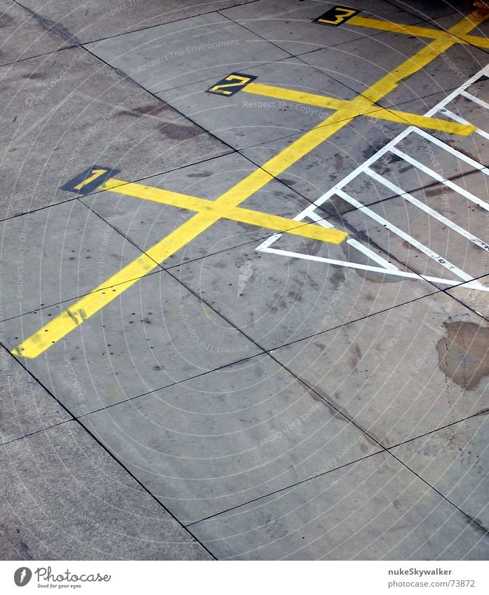 1, 2 or 3 - last chance... over! Parking lot Runway Asphalt Lane markings Diagonal Digits and numbers Yellow Gray White First Airport Street Line