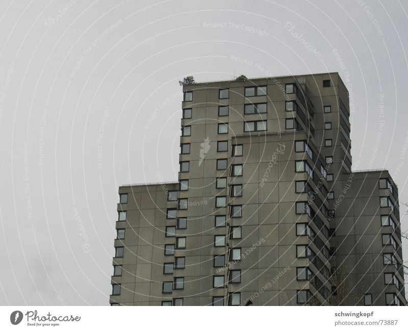 House in grey High-rise Window Story Gray Gloomy Dreary Settlement Facade Balcony Concrete Square Flat (apartment) Suburb Weather Shabby Patch terrace Sky