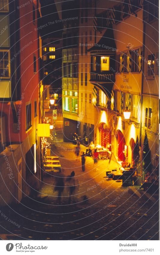 Zurich by night Night Dark Lantern Yellow Pedestrian Sidewalk café City life House (Residential Structure) Europe crap Lighting Movement