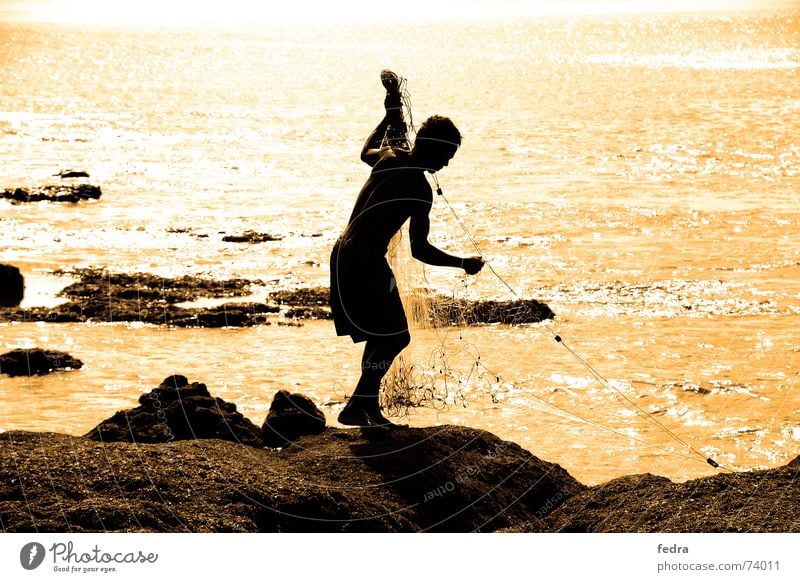 Fishermen in Bali Fisherman Sunset Ocean Longing Net Rock