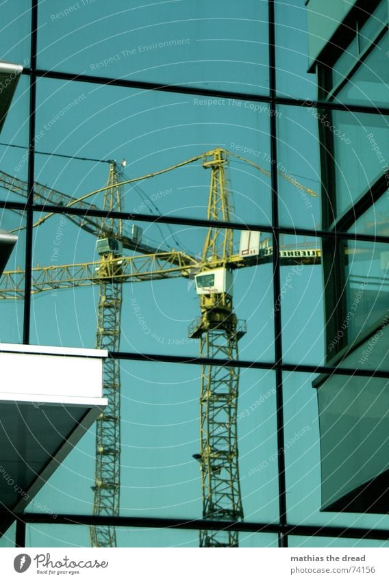 Mirroring cranes Crane Reflection Facade Construction site Downtown Berlin Alexanderplatz Yellow House (Residential Structure) Building Rectangle alex Blue