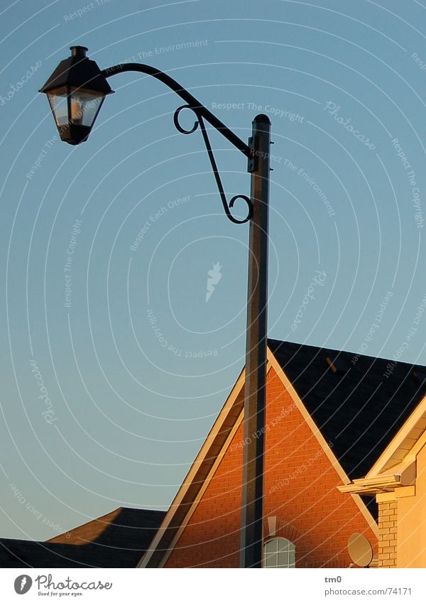 ready for action Street lighting Sunset House (Residential Structure) Toronto Canada Roof Light Physics Evening Shadow Blue Sky Warmth Old Lamp