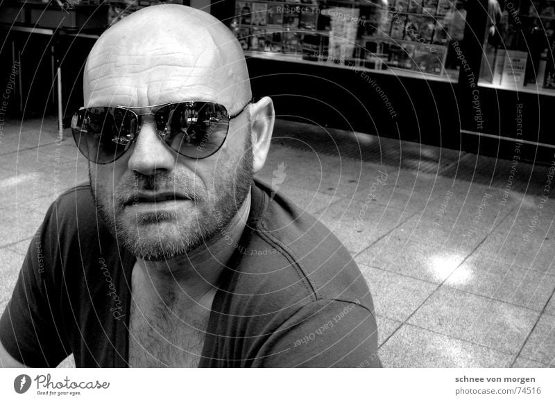 bugged Man Eyeglasses Sunglasses Light Reflection Facial hair Bald or shaved head Black & white photo v-cutout Looking Human being Cool (slang) tiled floor