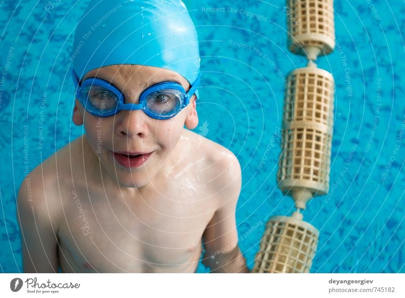 Little boy in swimming pool Joy Happy Leisure and hobbies Playing Vacation & Travel Summer Sports Swimming pool Child School Boy (child) Infancy Smiling