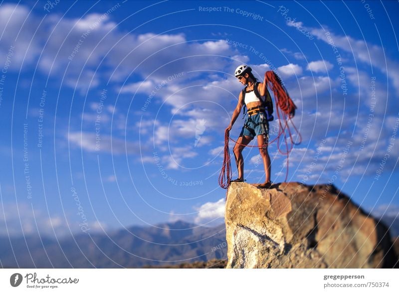 Female climber on the summit. Adventure Climbing Mountaineering Success Feminine 1 Human being 30 - 45 years Adults Clouds Self-confident Brave Determination