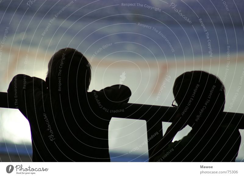 Bored children Child Gloomy Boredom Shadow play Handrail Silhouette Rear view 2 Break Frozen surface Ice stadium