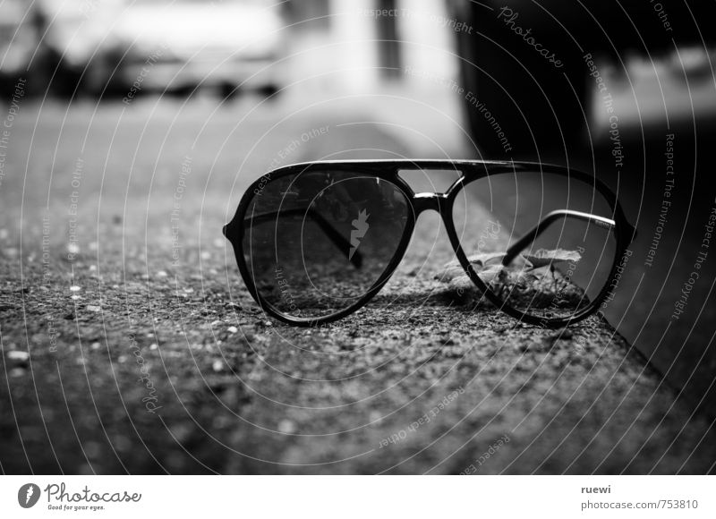 transparency Beautiful Illness Optician Eyeglasses Sunglasses Plant Wild plant Weed Deserted Street Car Accessory Stone Lie Old Broken Gray Black White brawl