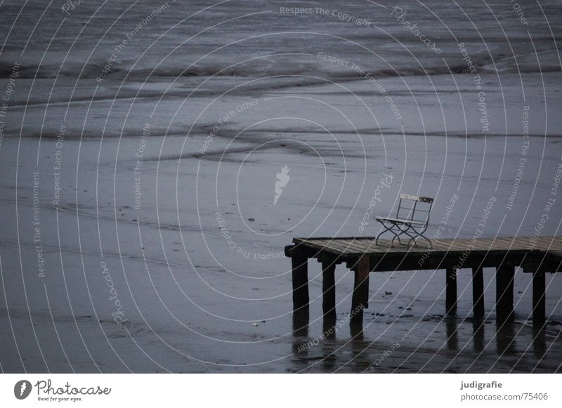 Bridge in Watt Footbridge Mud flats Ocean Lake Calm Loneliness Seating Low tide Vacation & Travel Reflection Salty Tideway North Sea Relaxation Chair Bench