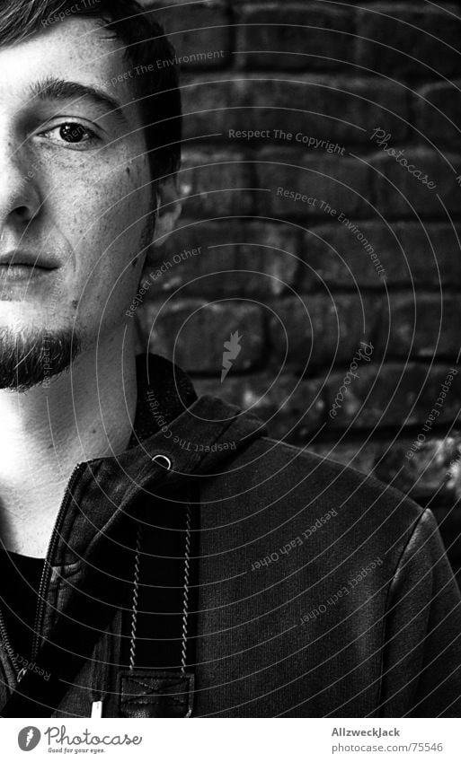 mauerBLÜMCHEN Man Gentleman Portrait photograph Black White Wall (barrier) Wall (building) Brick Facial hair Freckles Half Unemotional Gloomy Close-up