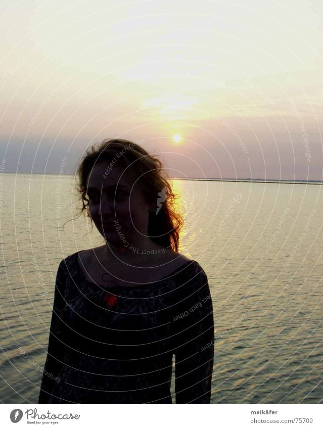 waiting ... Sunset Ocean Redness Clouds Woman Visual spectacle Back-light Horizon Vacation & Travel Beach North Sea Water Sky Hair and hairstyles Curl Blue