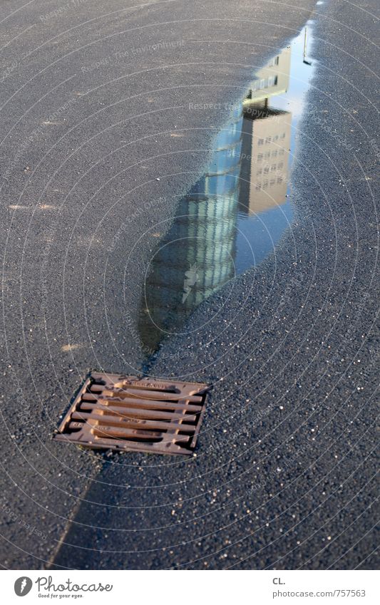 Dryness the last rest Water Town Deserted High-rise Places Manmade structures Building Architecture Street Lanes & trails Wet Gloomy Society Boredom Environment