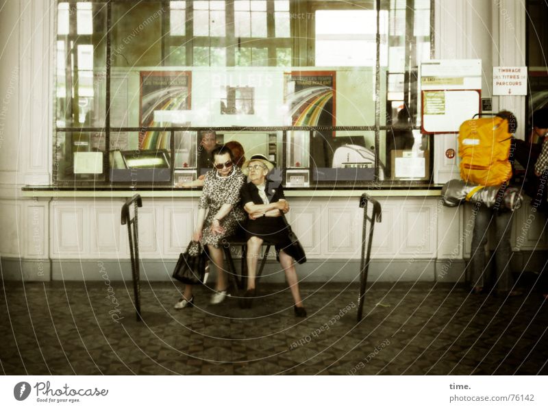 Two to Toulouse - Two senior citizens waiting chatting at the ticket counter in a station building Colour photo Subdued colour Interior shot Vacation & Travel