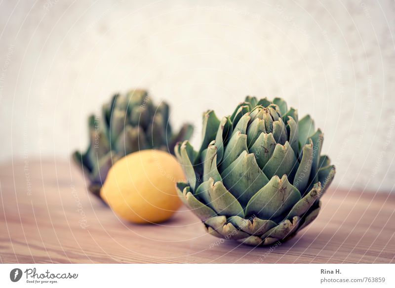 artichokes Vegetable Fruit Nutrition Vegetarian diet Fresh Healthy Lemon Artichoke Wooden board Vitamin Colour photo Deserted Copy Space left Copy Space right