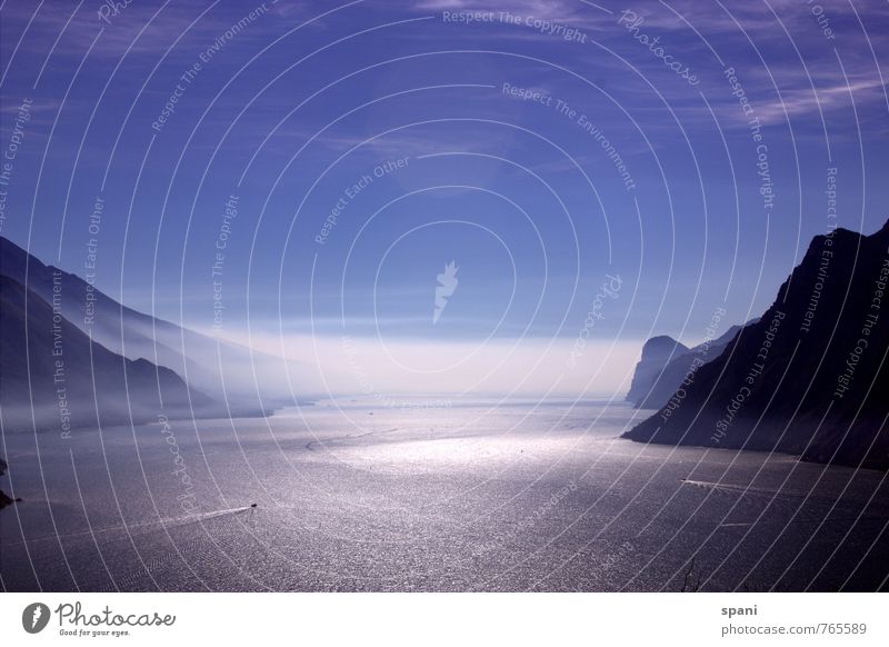 Lake Garda in the fog Aquatics Environment Landscape Mountain Peak Waves Esthetic Maritime Blue Black White Freedom Far-off places Colour photo Exterior shot