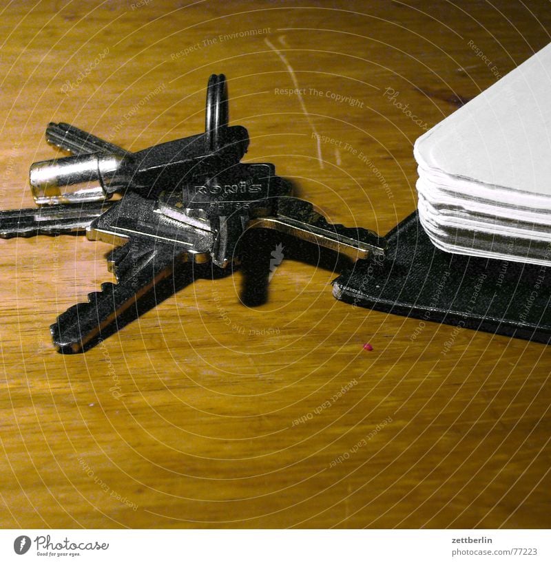 Key and unknown substance Table key ring Tenancy law Copy Space bottom Neutral Background