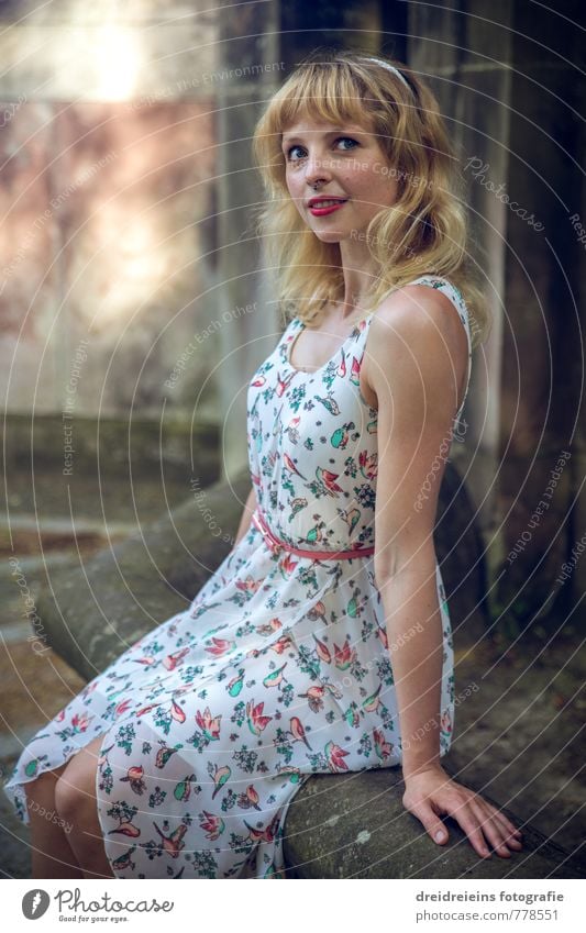 At the fountain in front of the gates Beautiful Feminine Young woman Youth (Young adults) 1 Human being Dress Blonde Long-haired Observe Smiling Looking Sit