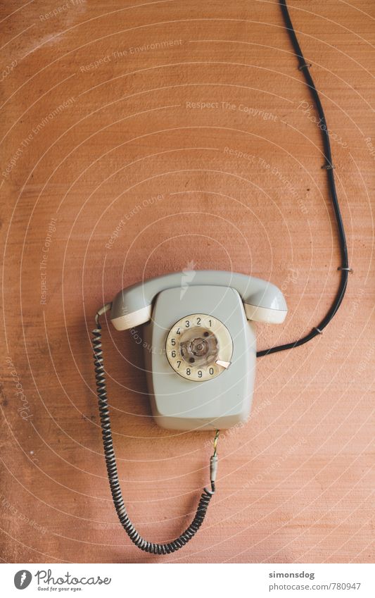 "hello world" Telephone To call someone (telephone) Old Rotary dial Cable Wall (building) Gray Connection Communicate Accessible Vintage Contact Colour photo