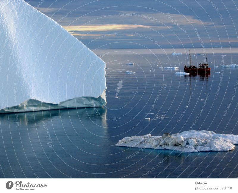 Alone in the ice Greenland Watercraft Ocean Arctic Ocean Iceberg Fishing boat Cold Winter Ice age Clouds White Reflection Horizon Corner Waves Motor barge Calm