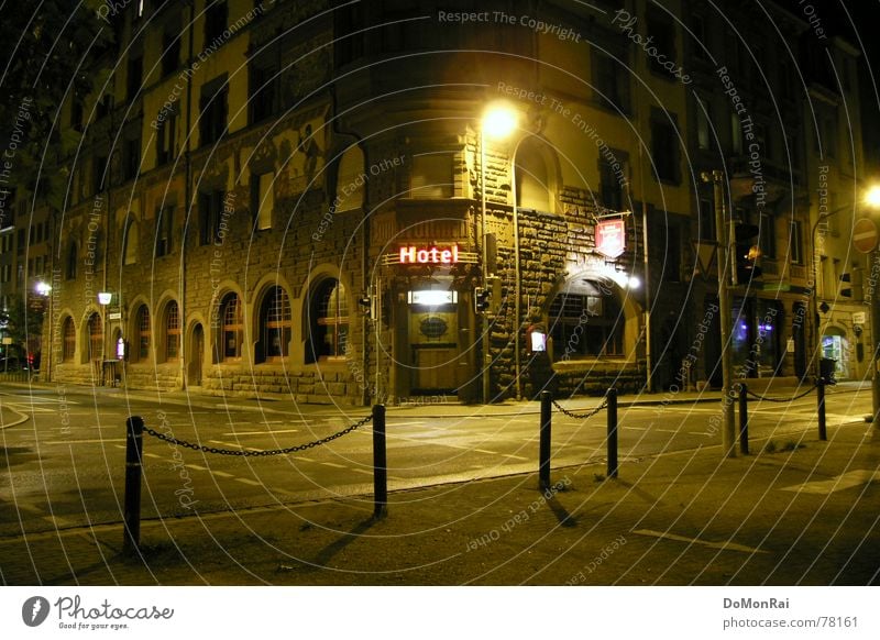 HOTEL Colour photo Exterior shot Deserted Night Light Shadow Central perspective House (Residential Structure) Lamp Gastronomy Town Gate Building Door Street