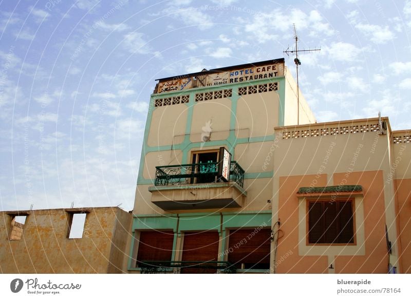 Room free Morocco Physics Hot Sun Brilliant Clouds Sheep Wall (building) Housefront Window Concrete Balcony Antenna Multicoloured Town Inhabited Life Culture