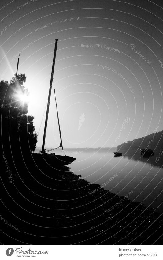 Morning Has Broken Ocean Watercraft Sailing ship Sunrise Twilight Gray scale value Shadow play Reflection Pebble Gravel beach Croatia Vacation & Travel