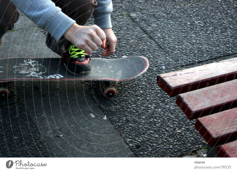 BEFORE THE JUMP Driving Jump Hop Beginning Shoelace Knee London Underground Skateboarding Crooked Expectation Nerviness Exciting Tension Asphalt Green Hand