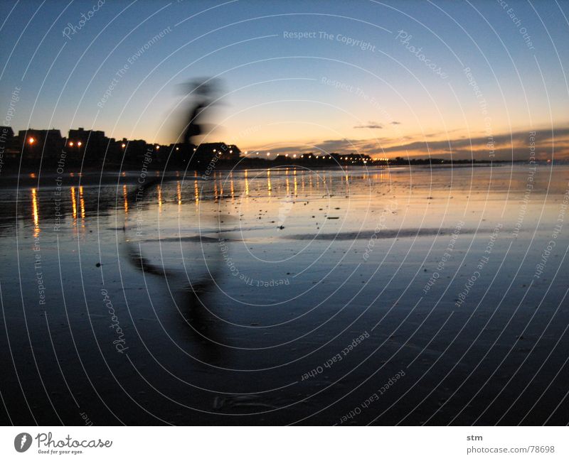 feel free ! Lake Ocean Beach Sunset Vacation & Travel Break Green Yellow Light Evening Waves Bathing place Reflection Clouds Man Romp Action Long exposure Water