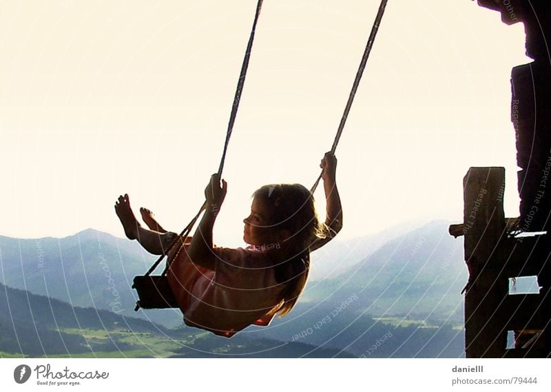 epicure Child Mountain Vacation & Travel Hut Girl Freedom Joy Swing To swing Alps Austrian Alps Federal State of Tyrol Dangerous Thrill Serene Alpine hut