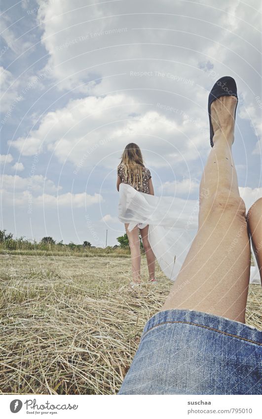 the modern woman shows leg Feminine Girl Life Body Skin Legs Feet 2 Human being Environment Nature Landscape Sky Horizon Summer Beautiful weather Field