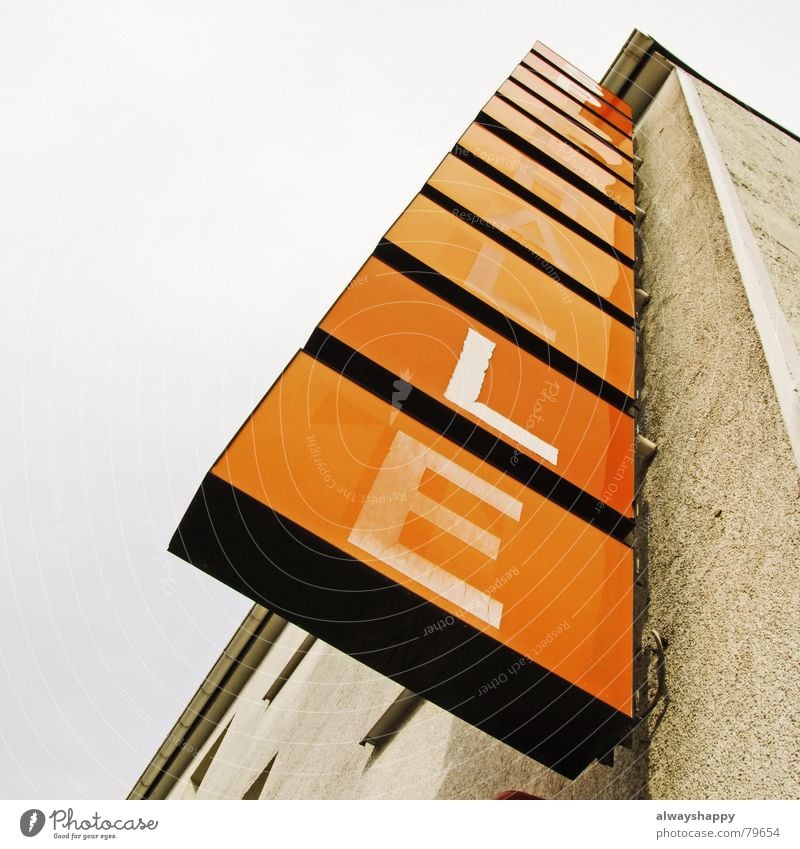 ...LLE Letters (alphabet) Facade House (Residential Structure) Gray Dirty Broken Closed Neon sign Derelict Characters Advertising Signs and labeling Sky Shabby