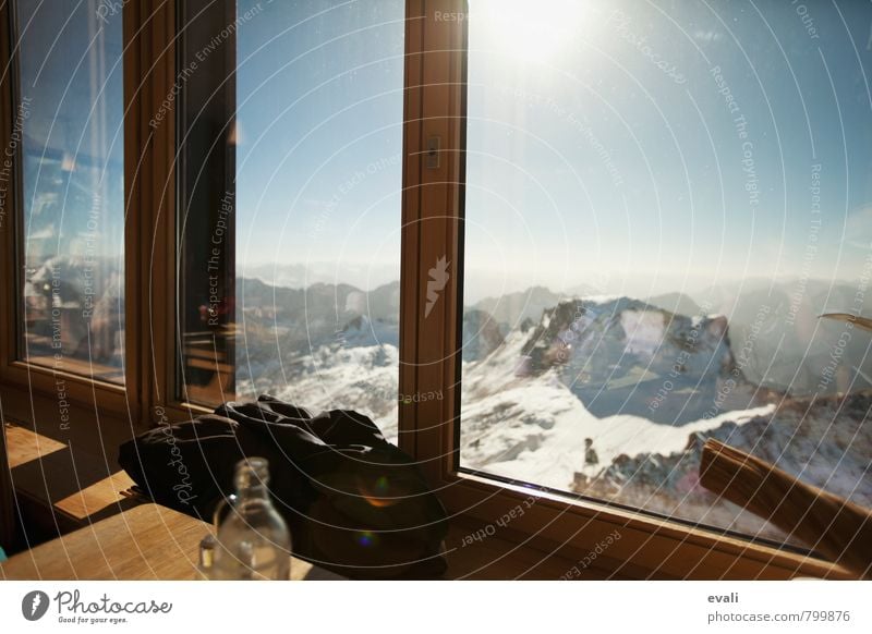 window look Nature Landscape Sun Beautiful weather Rock Alps Mountain Zugspitze Peak Snowcapped peak Café Restaurant Window Observe Happy Contentment