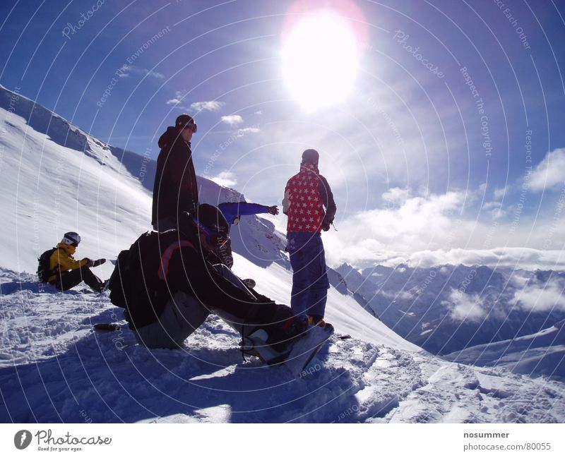 Snowboard Freeride Silvretta Deep snow Moody Switzerland Austria Clouds Winter sports off-piste backcountry silvretta sports girl Mountain Landscape Sky Sun