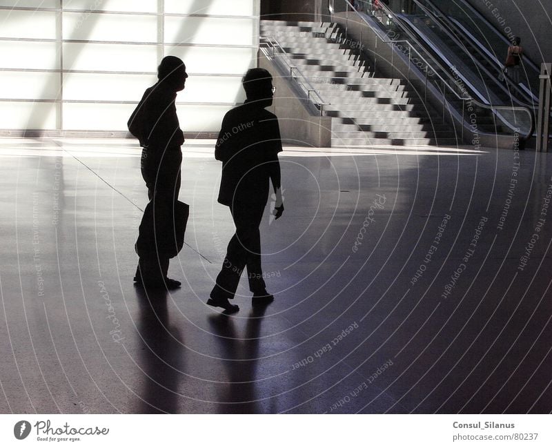 Potsdamer Platz train station Going Places Traffic infrastructure Berlin Underground Train station Human being Silhouette Shadow Stairs Street In pairs