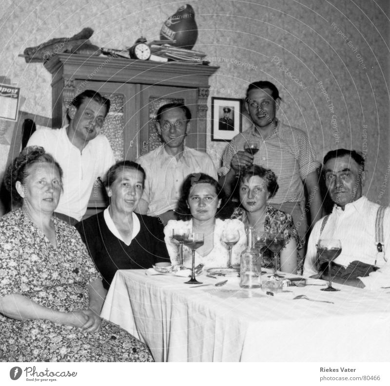 Family Brother Father Mother Wife Son Daughter Refugee Suspenders Husband Woman Man Party Wine glass Brothers and sisters Sister Photography Cupboard Kitchen