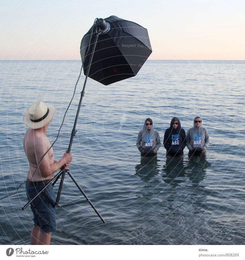 best boy on set Technology 4 Human being Art Stage play Actor Event Water Sky Horizon Waves Coast Beach Ocean Mediterranean sea T-shirt Sunglasses Hat