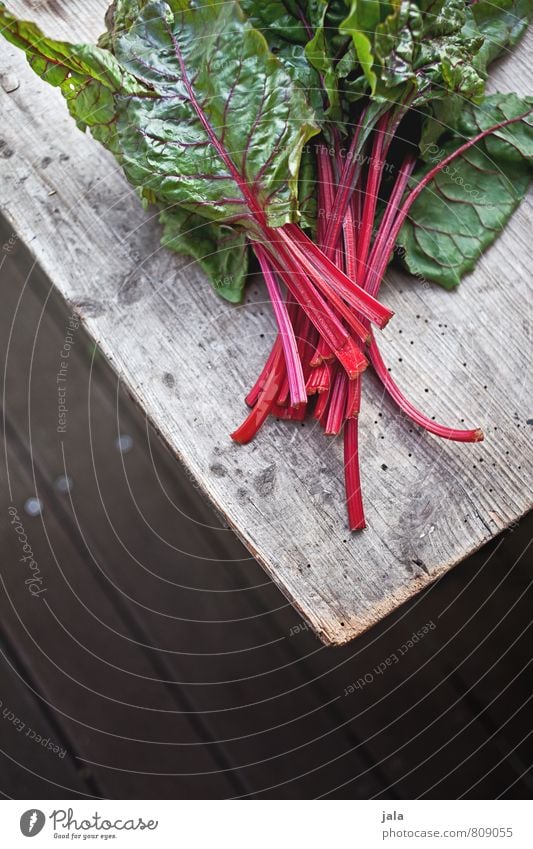 mangold Food Vegetable Mangold Nutrition Organic produce Vegetarian diet Healthy Eating Fresh Delicious Natural Wooden table Colour photo Exterior shot Deserted