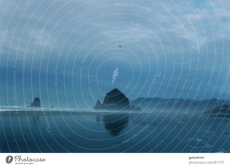 Haystack Rock Pacific Ocean Cannon Beach Dark Airplane haystack rock Blue Water