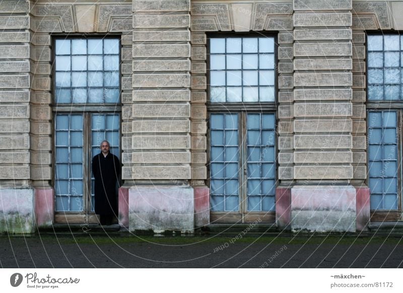 The man in the door / the man in the door Window Man Coat Dark Camouflage House (Residential Structure) Charlottenburg castle Doorframe Reflection Motionless